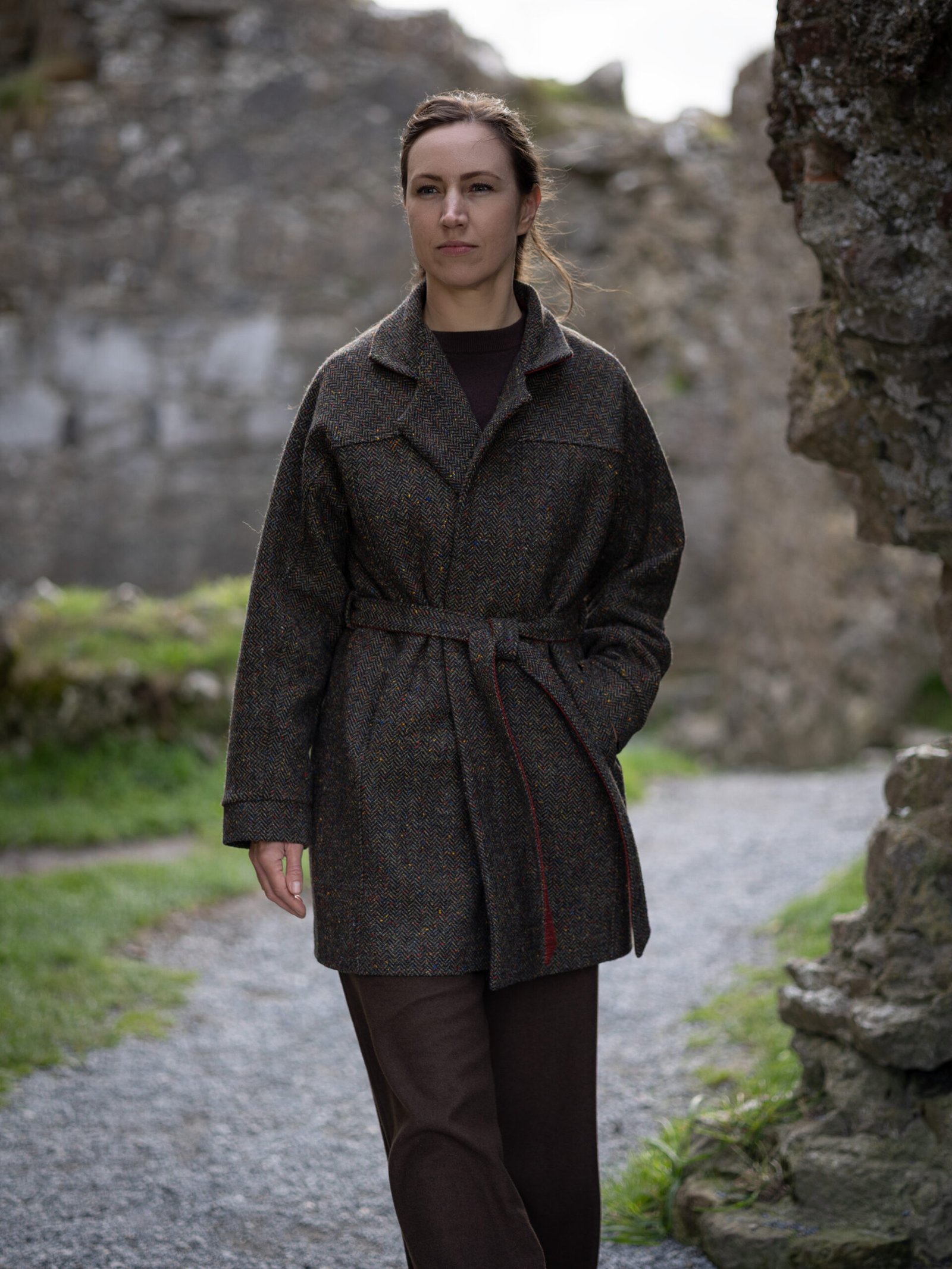 Light belted coat photographed in the Irish countryside